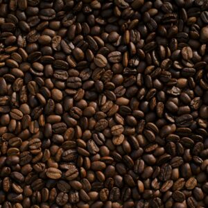 Close-up of glossy whole coffee beans